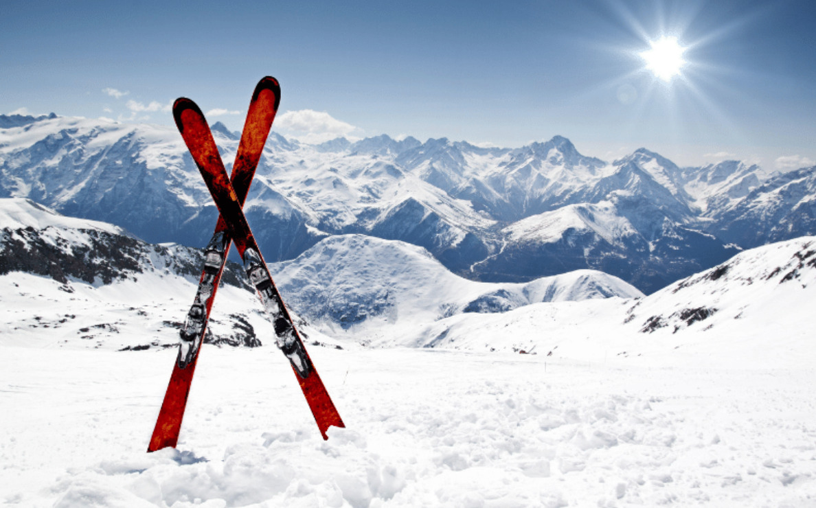 skis in the snow over a mountain